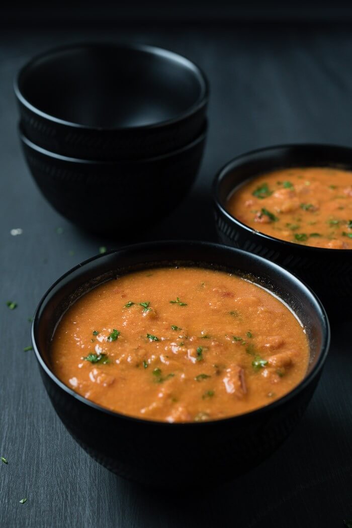 chickpea soup in black bowls
