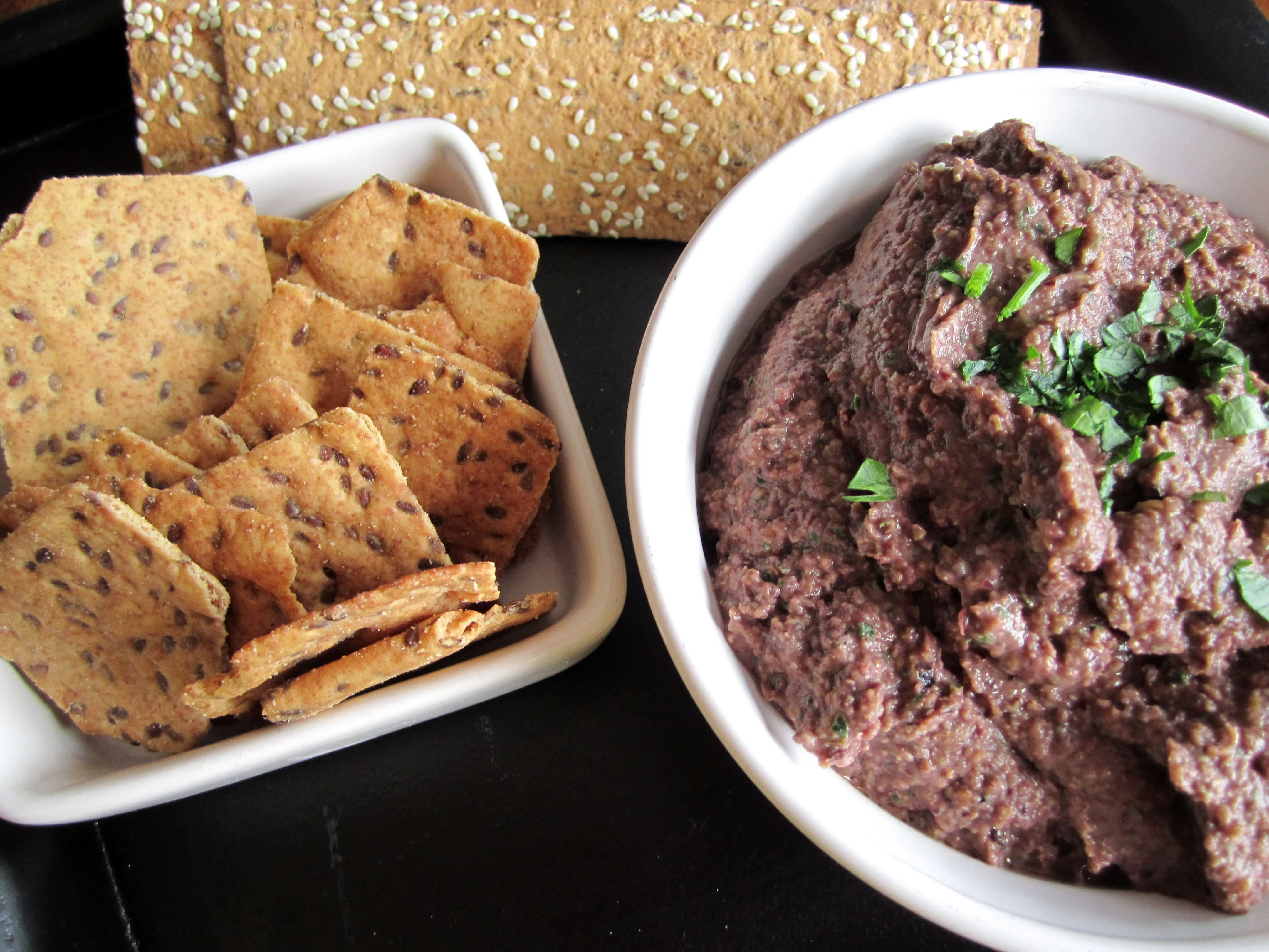 olive and lentil tapenda with crackers for dipping