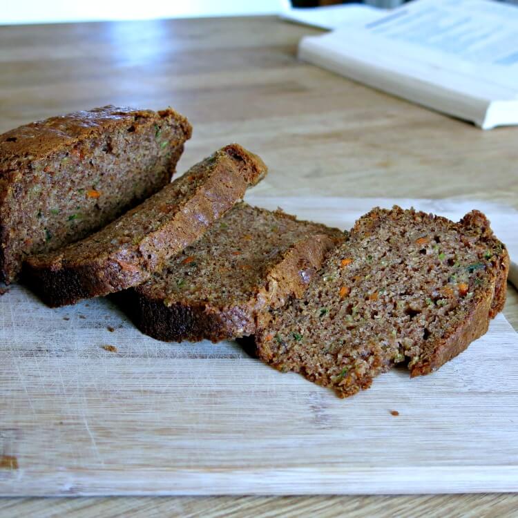 sliced zucchini and carrot bread on a cutting board