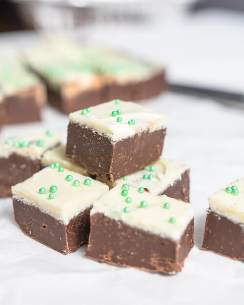 chocolate mint fudge with white chocolate topping and green sprinkles