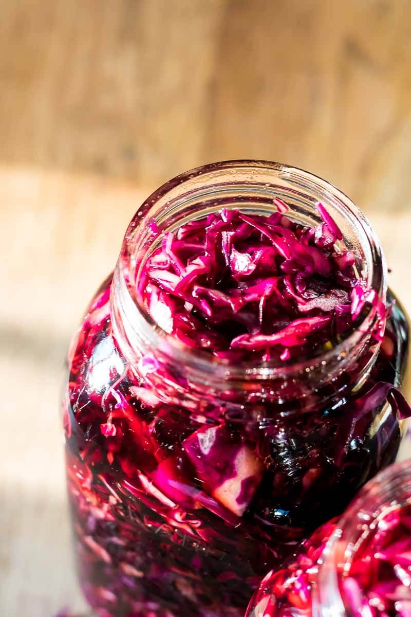 top view of a jar of pickled red cabbage. jar is open