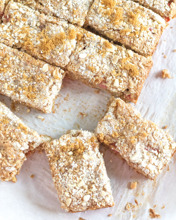 rhubarb crumb bars on parchment paper