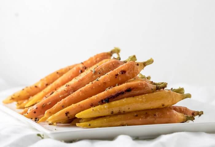 oven roasted carrots on a plate ready for serving