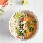Red lentil curry in a bowl with rice