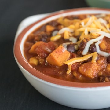 Sweet Potato and Black Bean Chili with Cheese on top