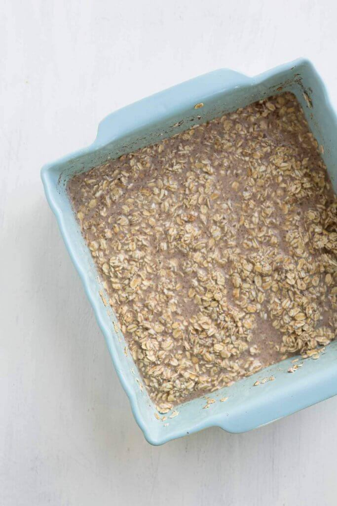 oats mixed into almond milk for baked oats