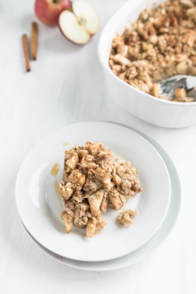 apple cinnamon baked oatmeal served with maple syrup,