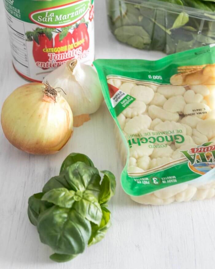 gnocchi, canned tomatoes, basil and spinach