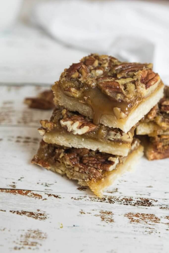 a stack of pecan pie bars