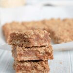 a stack of apple butter oatmeal bars