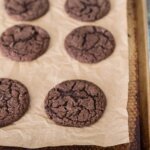 dark chocolate crinkle cookies with espresso on a baking sheet
