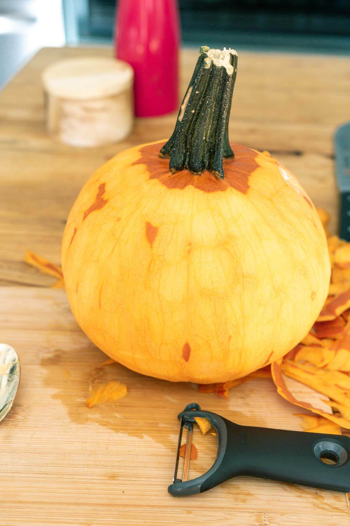 a small pie pumpkin peeled with a vegetable peeler