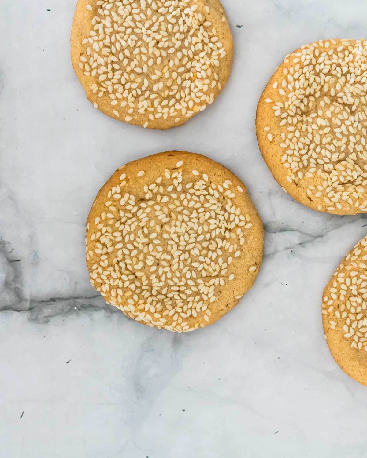 sesame butter cookies on a marble counter top